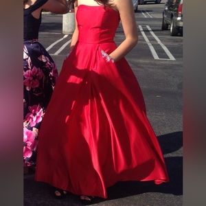 Red Blondie Nite satin prom dress.